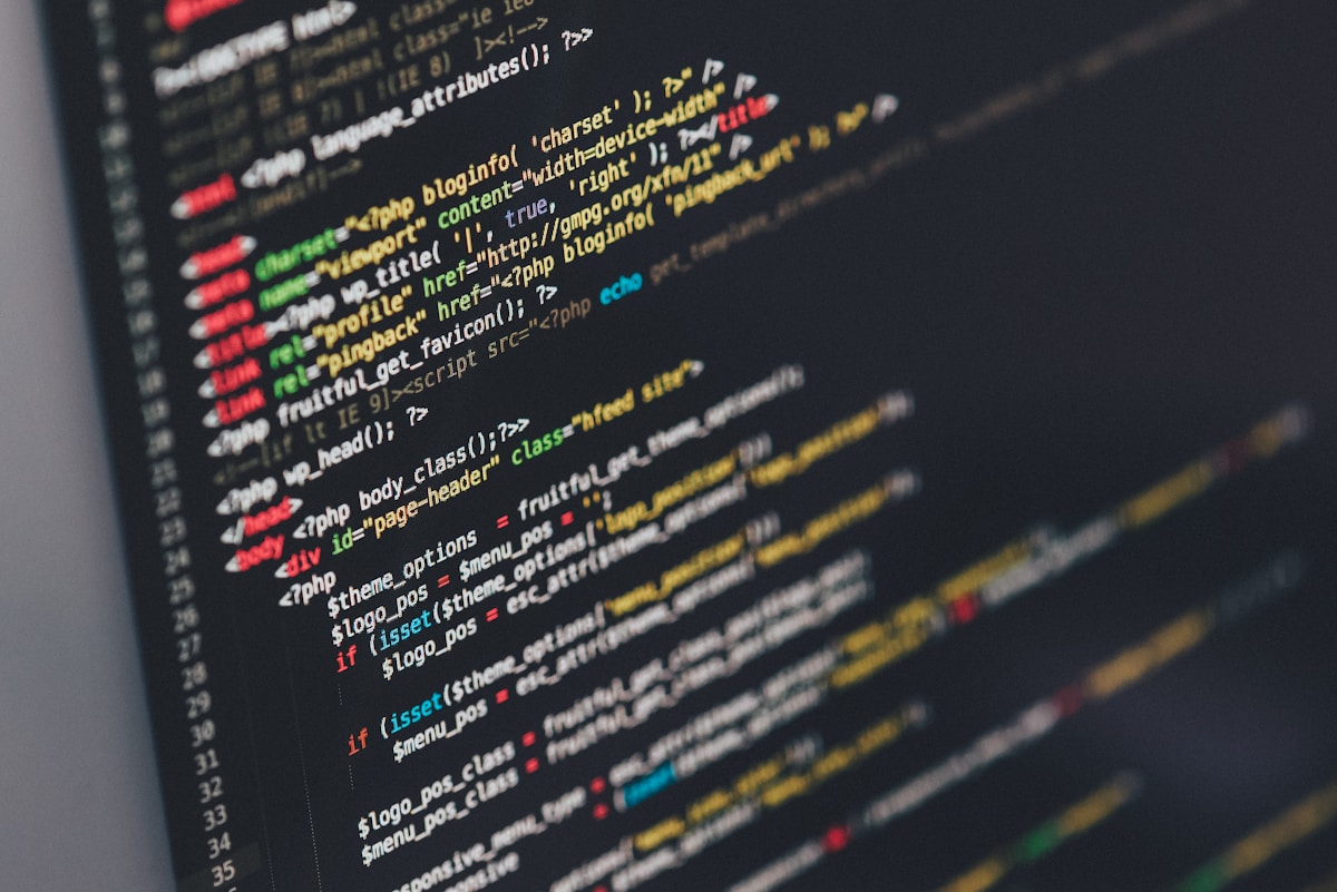 Integration engineer working on API deployment configuration at a modern fintech desk