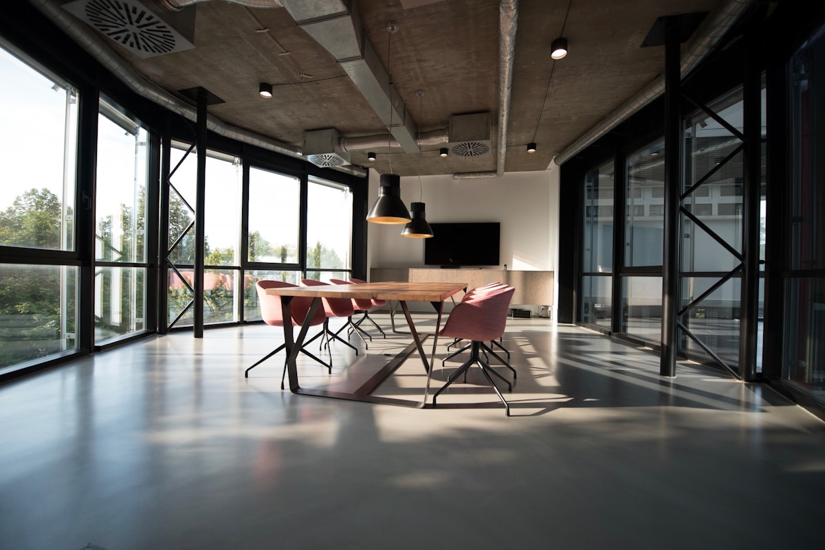 Modern fintech office reception area with clean contemporary design at One-North Singapore